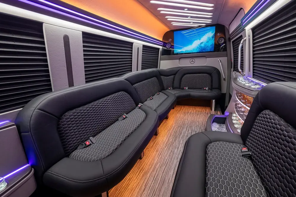Executive Sprinter cabin with facing seats and conference table